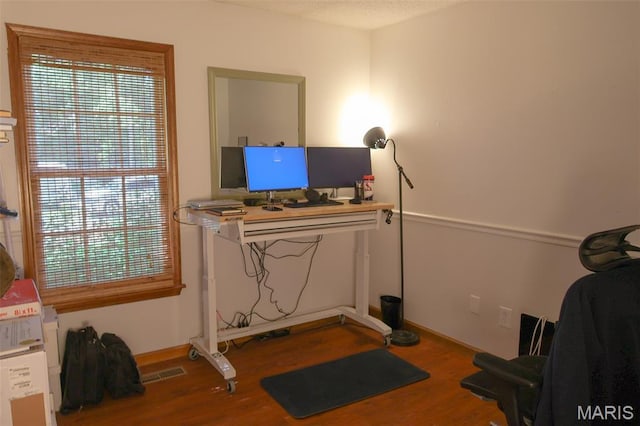 5501 Dober Ln, Saint Louis, MO 63129 - office space featuring wood finished floors and baseboards