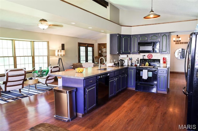 5501 Dober Ln, Saint Louis, MO 63129 - kitchen with black appliances, a sink, a peninsula, vaulted ceiling, and decorative backsplash