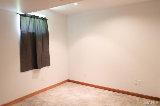 5501 Dober Ln, Saint Louis, MO 63129 - empty room featuring baseboards and recessed lighting