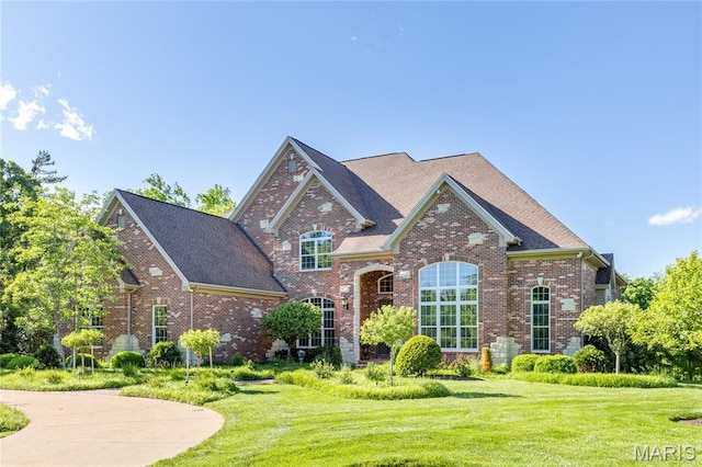13815 Clayton Rd, Chesterfield, MO 63017 - traditional-style house with brick siding and a front lawn