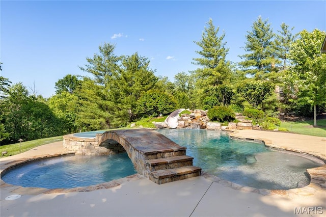 13815 Clayton Rd, Chesterfield, MO 63017 - view of swimming pool with a patio and a pool with connected hot tub