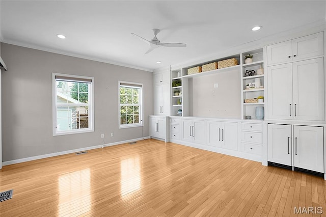 385 E Clinton Pl, Saint Louis, MO 63122 - unfurnished living room with light wood-style flooring, a ceiling fan, crown molding, baseboards, and recessed lighting