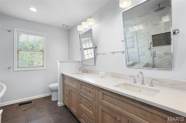 385 E Clinton Pl, Saint Louis, MO 63122 - full bath featuring baseboards, a stall shower, healthy amount of natural light, toilet, and recessed lighting