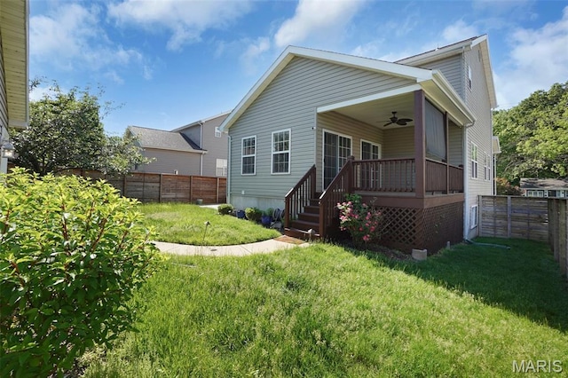 385 E Clinton Pl, Saint Louis, MO 63122 - back of house with a ceiling fan and a wooden deck