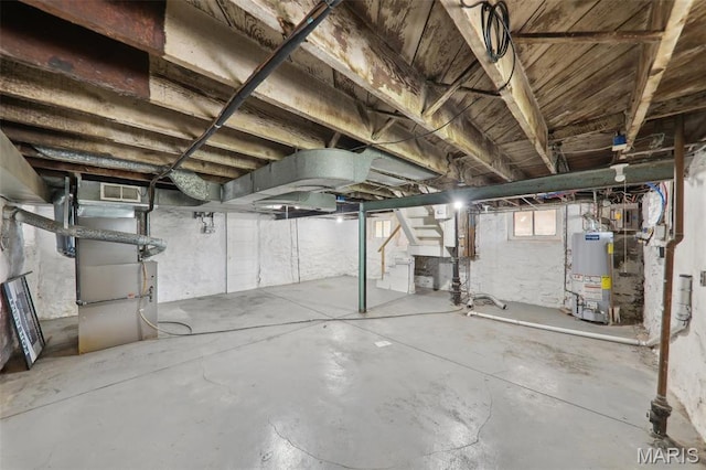 4942 Bonita Ave, Saint Louis, MO 63109 - below grade area with water heater, stairway, and heating unit