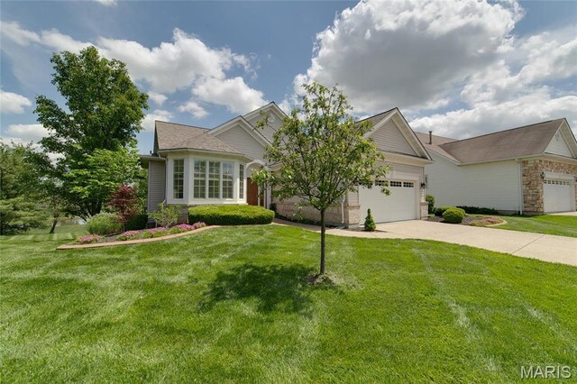 obstructed view of property featuring concrete driveway, a garage, and a front yard