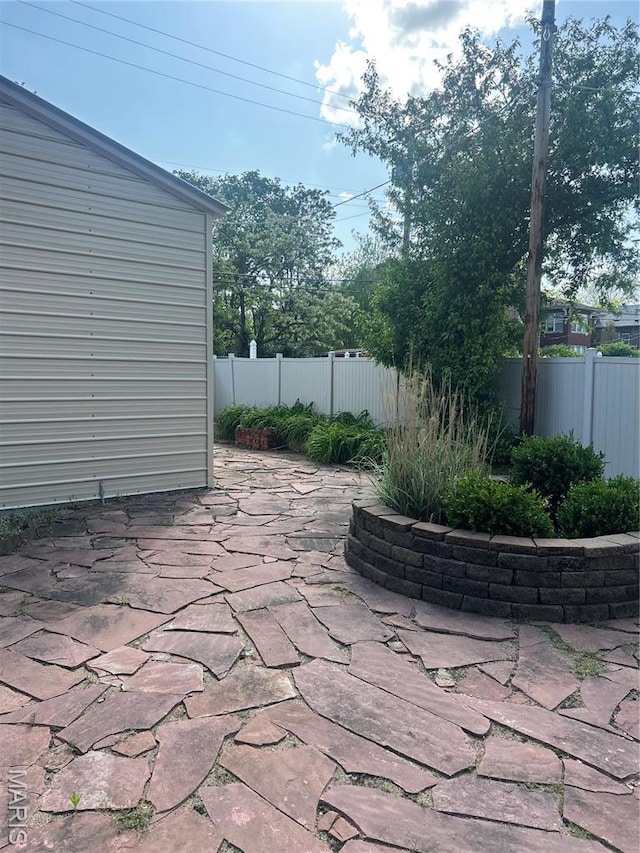 6278 Cates Ave, Saint Louis, MO 63130 - view of patio featuring a fenced backyard