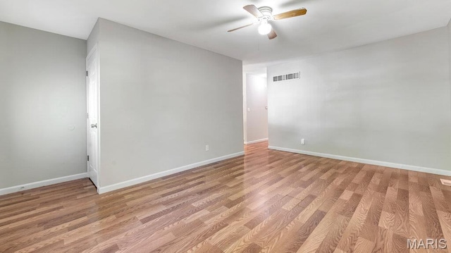 939 Vosholl Ave, Warrenton, MO 63383 - spare room featuring ceiling fan, baseboards, and light wood finished floors