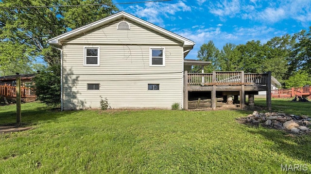 939 Vosholl Ave, Warrenton, MO 63383 - back of property featuring a deck and a lawn