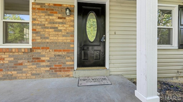 939 Vosholl Ave, Warrenton, MO 63383 - view of exterior entry with brick siding