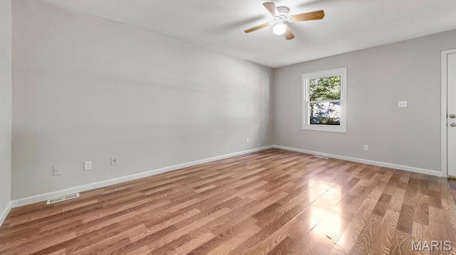 939 Vosholl Ave, Warrenton, MO 63383 - spare room with a ceiling fan, light wood-style floors, and baseboards
