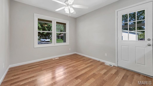 939 Vosholl Ave, Warrenton, MO 63383 - spare room with light wood-style flooring, baseboards, and a ceiling fan