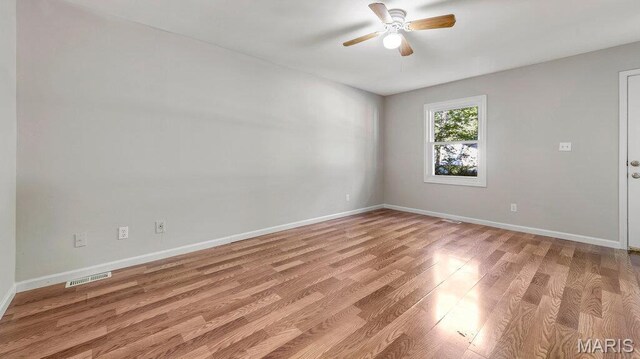 939 Vosholl Ave, Warrenton, MO 63383 - spare room featuring a ceiling fan, light wood-style flooring, and baseboards