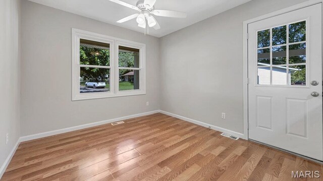 939 Vosholl Ave, Warrenton, MO 63383 - spare room with light wood-type flooring, baseboards, and ceiling fan
