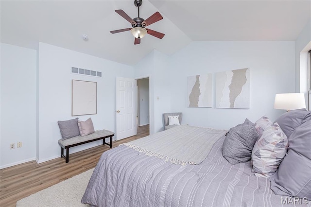 200 Kylewood Ct, Ballwin, MO 63021 - bedroom with wood finished floors, lofted ceiling, baseboards, and ceiling fan