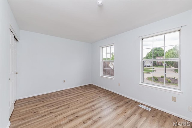 200 Kylewood Ct, Ballwin, MO 63021 - spare room with light wood-style floors, a smoke detector, and baseboards