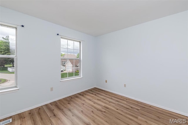 200 Kylewood Ct, Ballwin, MO 63021 - unfurnished room with light wood-style floors and baseboards