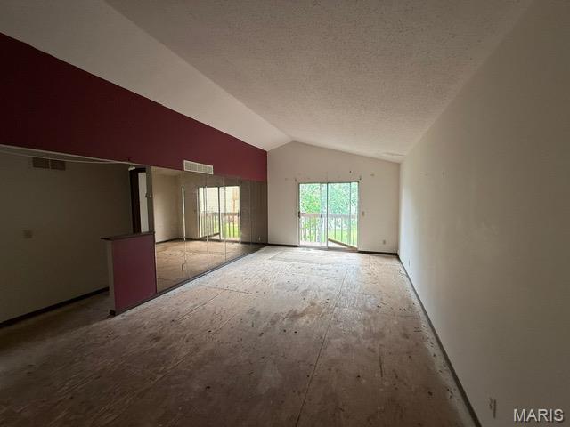 12910 Autumn View Dr, Saint Louis, MO 63146 - empty room with lofted ceiling