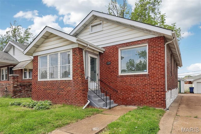 5909 Hampton Ave, Saint Louis, MO 63109 - bungalow with entry steps and brick siding
