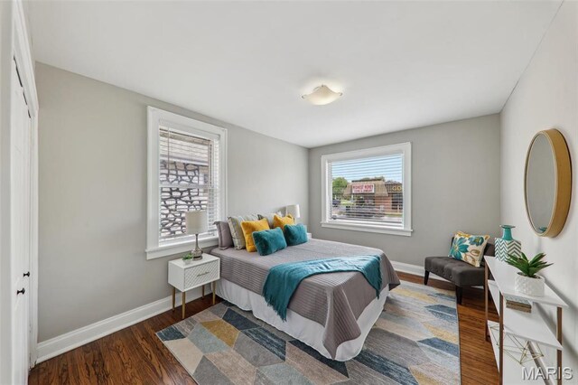 5909 Hampton Ave, Saint Louis, MO 63109 - bedroom featuring wood finished floors and baseboards