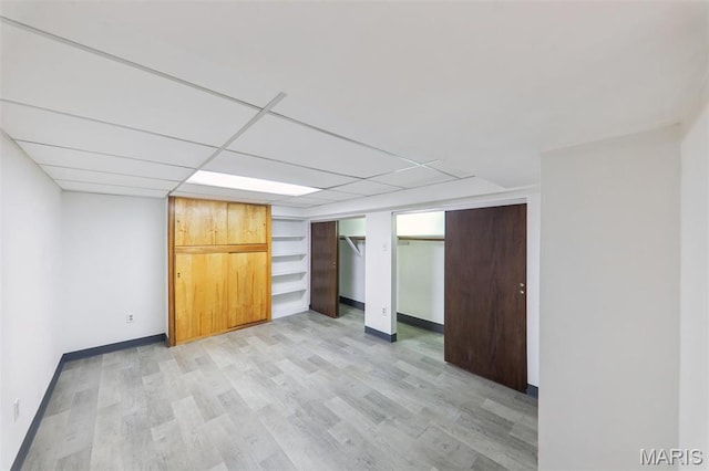 5909 Hampton Ave, Saint Louis, MO 63109 - unfurnished bedroom featuring light wood finished floors and baseboards
