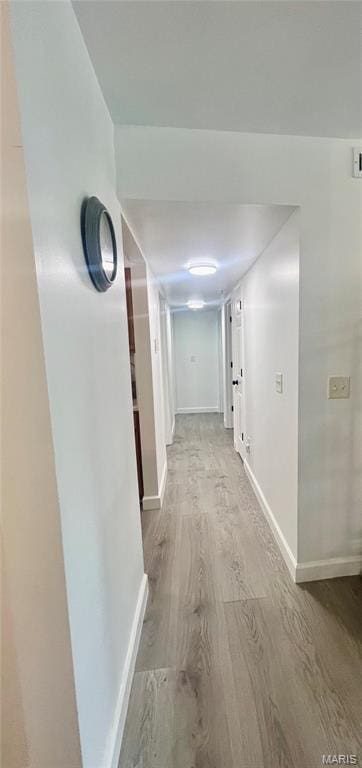 3605 Tracey Rich Rd Unit 1A, Saint Louis, MO 63125 - hall featuring light wood-type flooring and baseboards