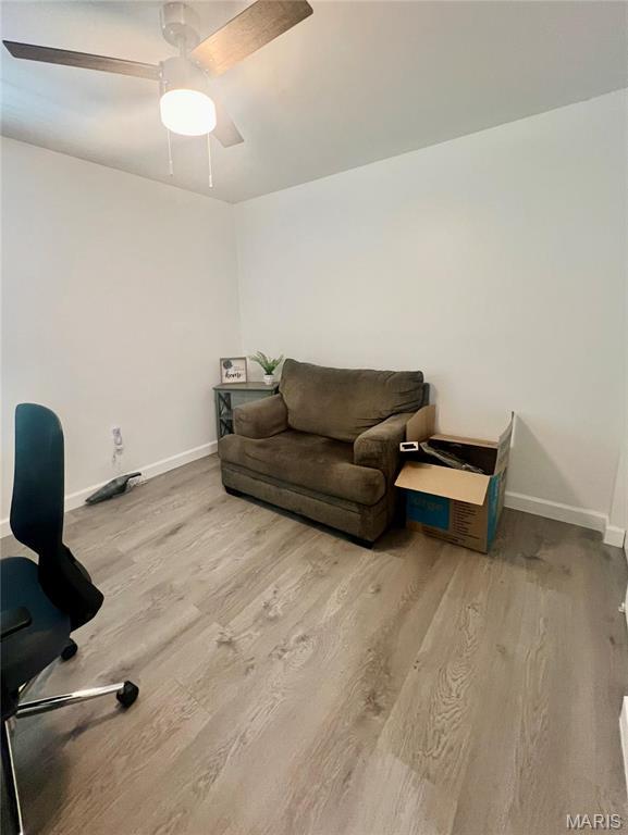 3605 Tracey Rich Rd Unit 1A, Saint Louis, MO 63125 - office space featuring wood finished floors, baseboards, and ceiling fan