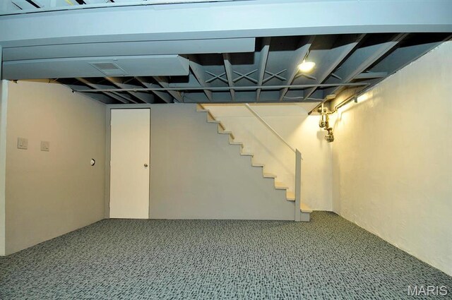 7051 Lansdowne Ave, Saint Louis, MO 63109 - finished below grade area featuring carpet floors and stairway
