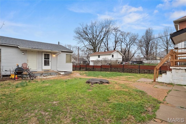 view of yard featuring stairway