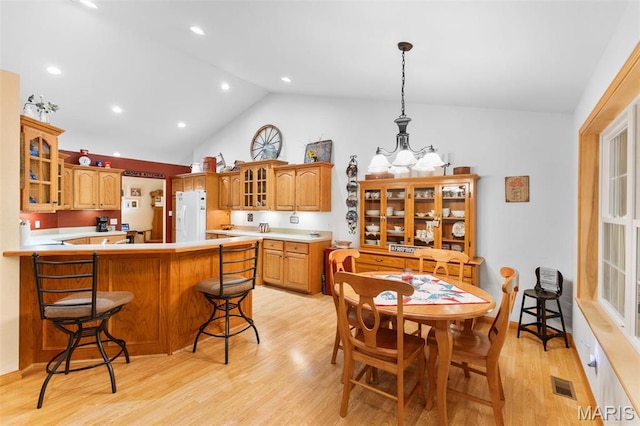 102 Timber Ln, Farmington, MO 63640 - dining space featuring light wood-type flooring, high vaulted ceiling, and recessed lighting