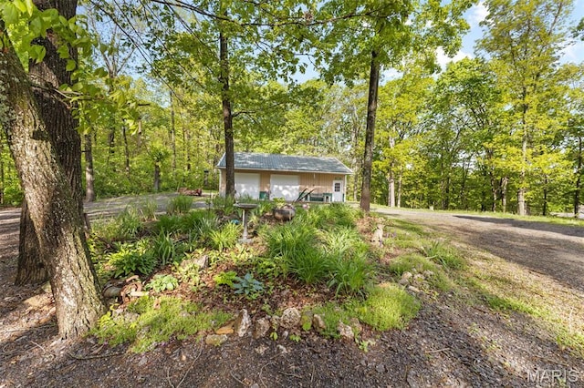 102 Timber Ln, Farmington, MO 63640 - view of yard with a garage and an outbuilding