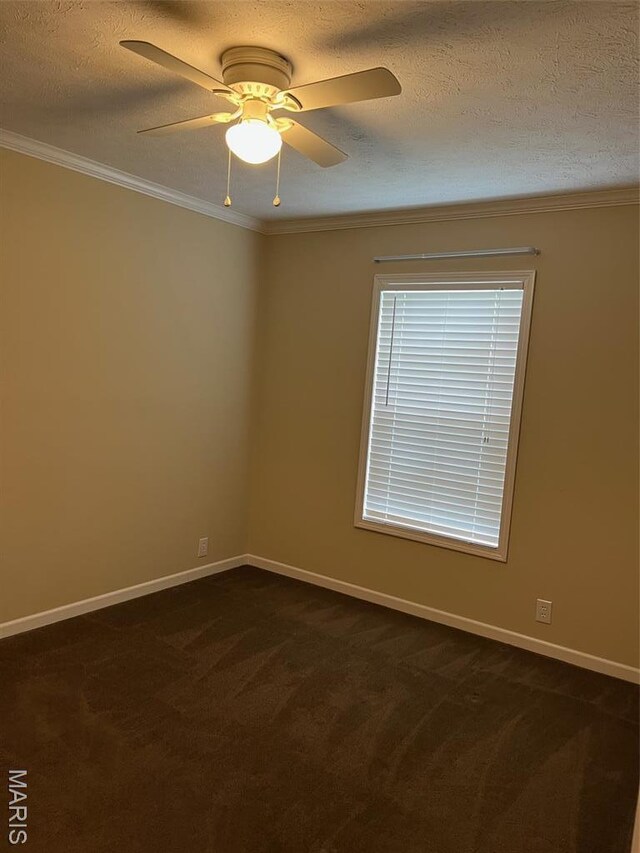 474 Bluffview Dr, Piedmont, MO 63957 - empty room with dark carpet, crown molding, baseboards, a textured ceiling, and ceiling fan