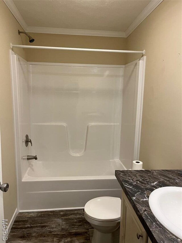 474 Bluffview Dr, Piedmont, MO 63957 - bathroom with vanity, ornamental molding, toilet, shower / washtub combination, and wood finished floors
