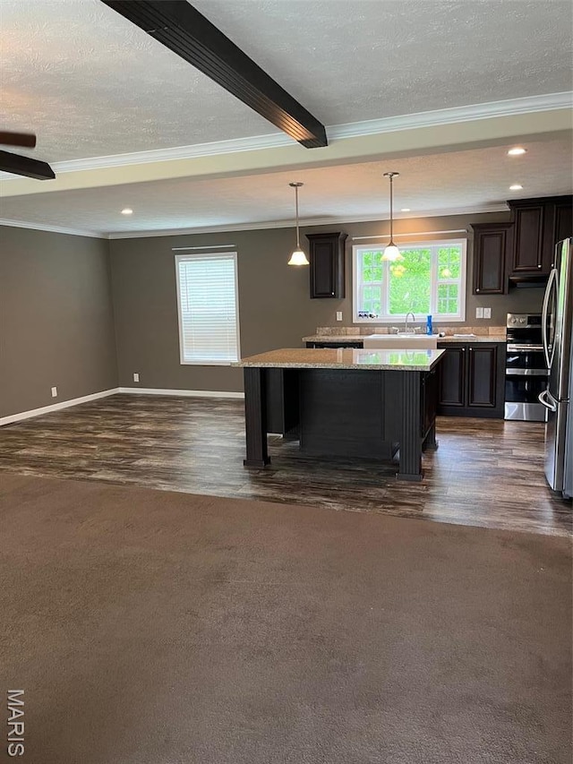 474 Bluffview Dr, Piedmont, MO 63957 - kitchen with stainless steel appliances, ornamental molding, baseboards, a center island, and open floor plan