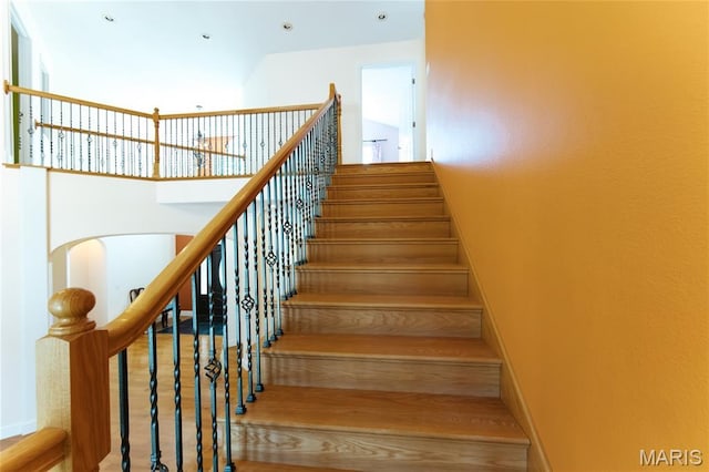 1025 Cobblestone Dr, Rolla, MO 65401 - staircase featuring wood finished floors