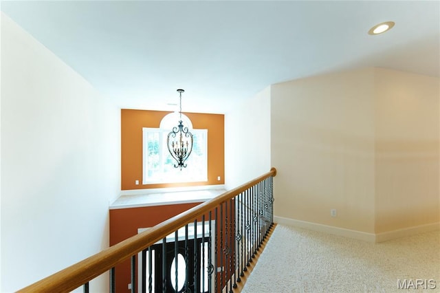 1025 Cobblestone Dr, Rolla, MO 65401 - hall with a chandelier, recessed lighting, baseboards, and carpet