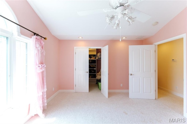 1025 Cobblestone Dr, Rolla, MO 65401 - unfurnished bedroom featuring carpet flooring, a closet, a walk in closet, recessed lighting, and baseboards