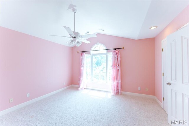 1025 Cobblestone Dr, Rolla, MO 65401 - spare room with vaulted ceiling, carpet floors, a ceiling fan, baseboards, and recessed lighting