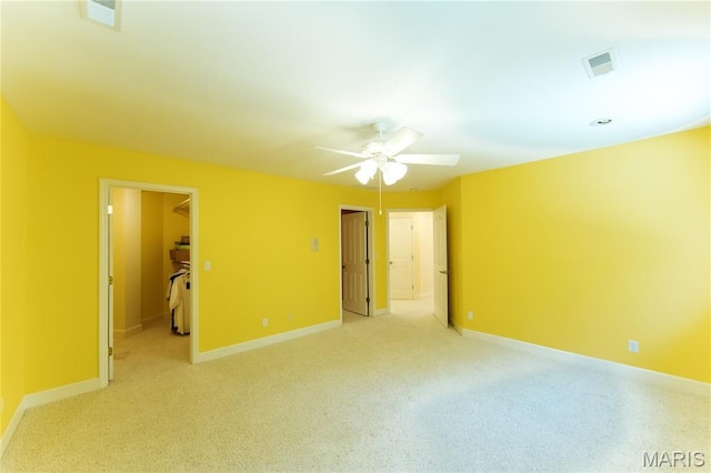 1025 Cobblestone Dr, Rolla, MO 65401 - empty room featuring a ceiling fan, baseboards, and light carpet