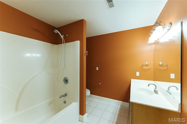 1025 Cobblestone Dr, Rolla, MO 65401 - full bathroom featuring toilet, vanity, tile patterned floors, shower / tub combination, and baseboards