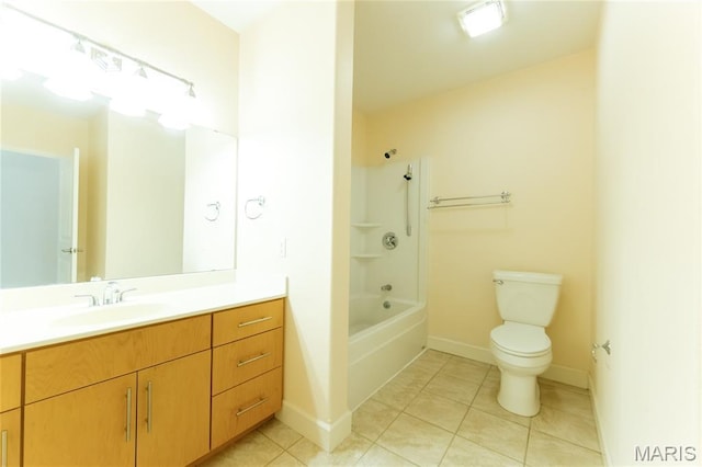 1025 Cobblestone Dr, Rolla, MO 65401 - full bath with vanity, toilet, tile patterned floors, baseboards, and washtub / shower combination