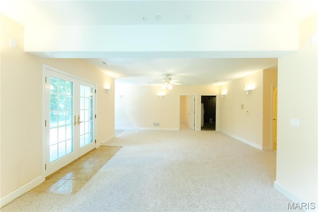 1025 Cobblestone Dr, Rolla, MO 65401 - empty room featuring light carpet, a ceiling fan, and baseboards