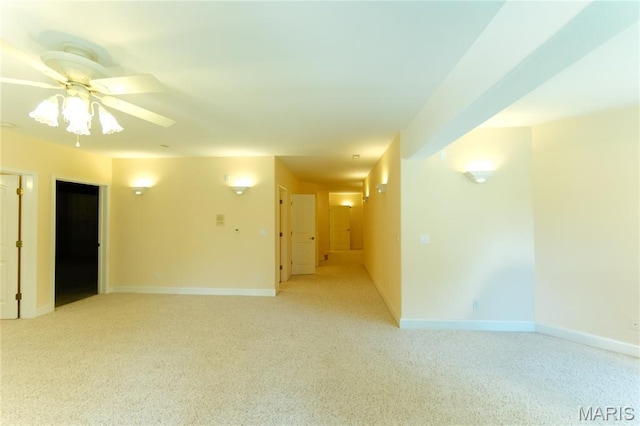 1025 Cobblestone Dr, Rolla, MO 65401 - spare room with light carpet, baseboards, and a ceiling fan