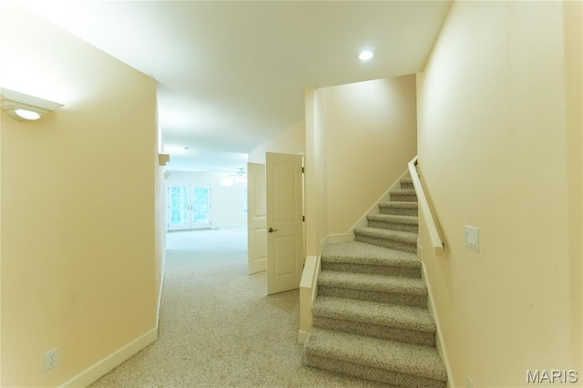 1025 Cobblestone Dr, Rolla, MO 65401 - staircase featuring baseboards, carpet, and recessed lighting