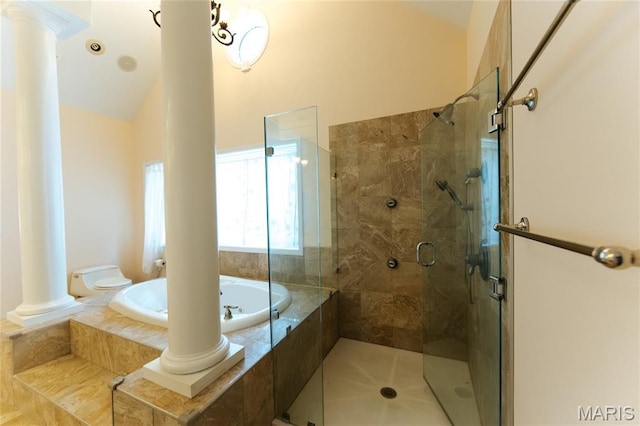1025 Cobblestone Dr, Rolla, MO 65401 - bathroom featuring ornate columns, a garden tub, a stall shower, and lofted ceiling