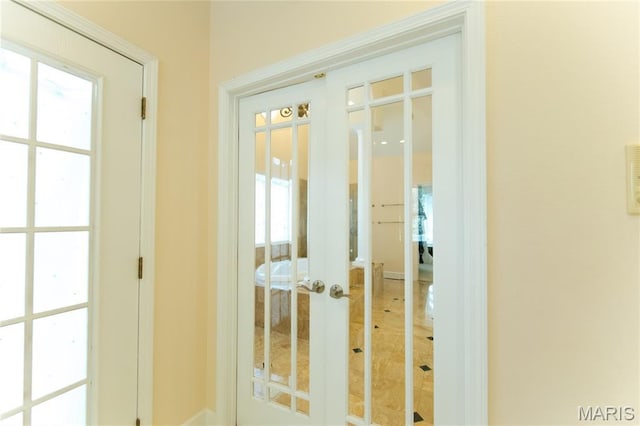 1025 Cobblestone Dr, Rolla, MO 65401 - doorway to outside featuring french doors and healthy amount of natural light