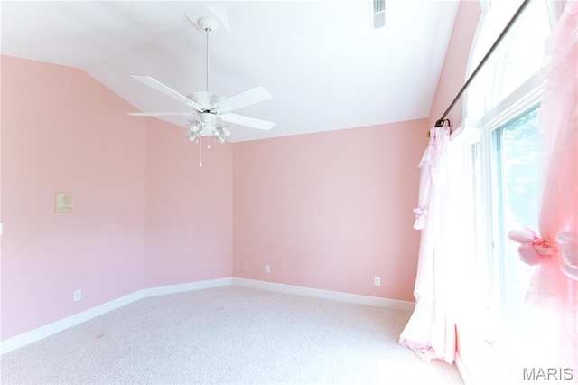 1025 Cobblestone Dr, Rolla, MO 65401 - spare room featuring vaulted ceiling, ceiling fan, light colored carpet, and baseboards