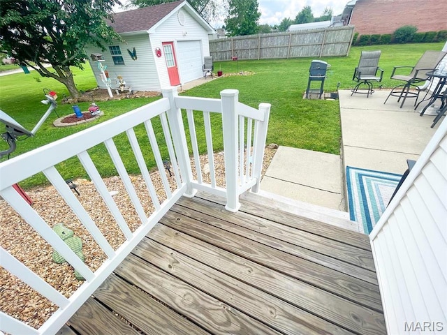 11652 Two Mile Rd, Dexter, MO 63841 - deck featuring a garage and an outbuilding