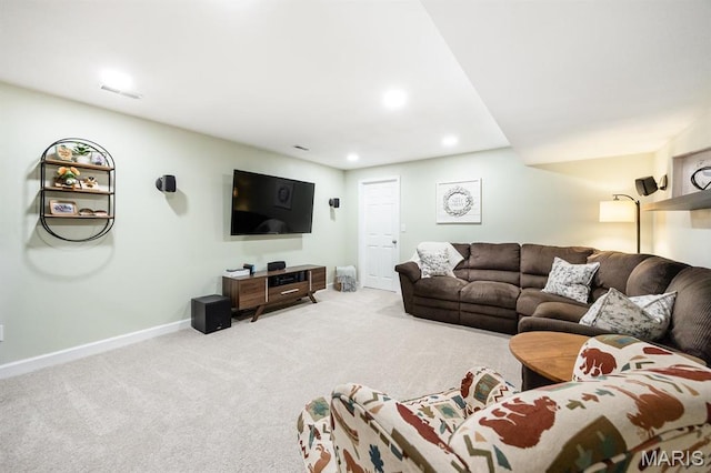 carpeted living room featuring baseboards and recessed lighting