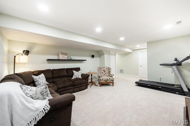 living room with recessed lighting, carpet flooring, and baseboards